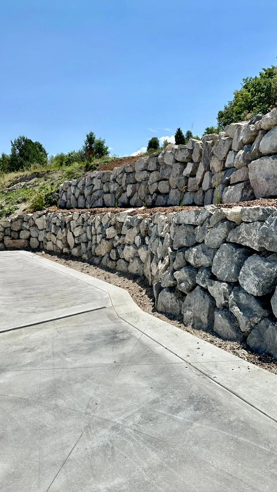 Rock retaining wall built by Rock Designz & Excavation in Salt Lake County Utah
